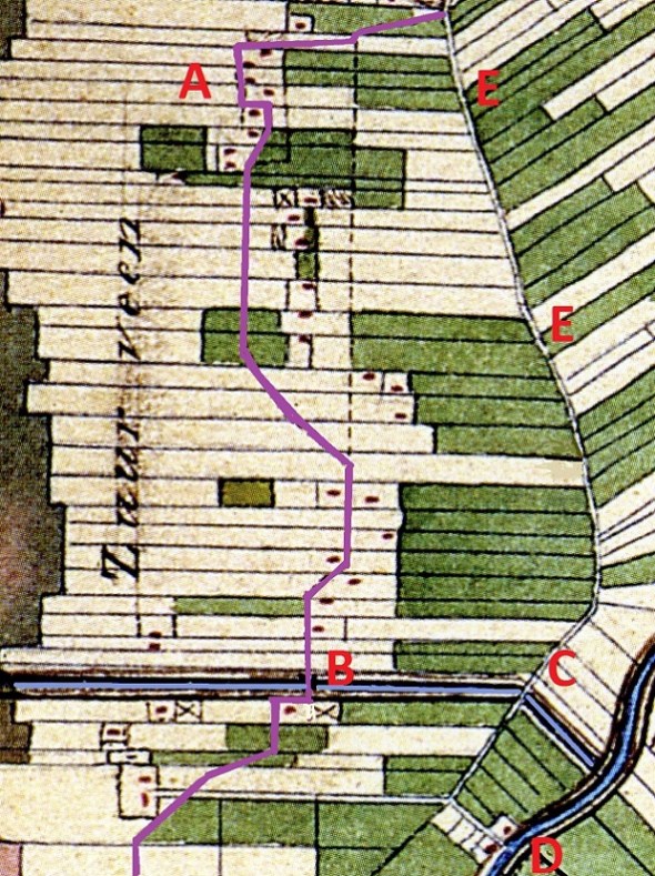 Het Hondepad door Zuiderveen (lila). A = Woonplaats vande bezwaarden tegen afsnijding Hondepad ; B = Bat over door Zuiderveenster Hoofdwijk; C = Klap in de rijweg; D = Strobos; E = De toenmalige rijweg Winschoten-Pekela (nu verdwenen).